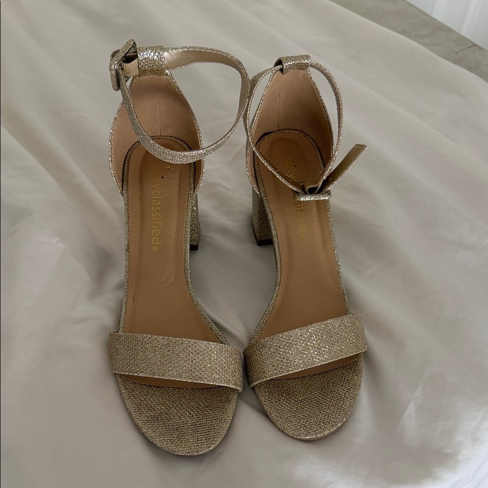 Classified Shimmering Gold Ankle Strap Heels